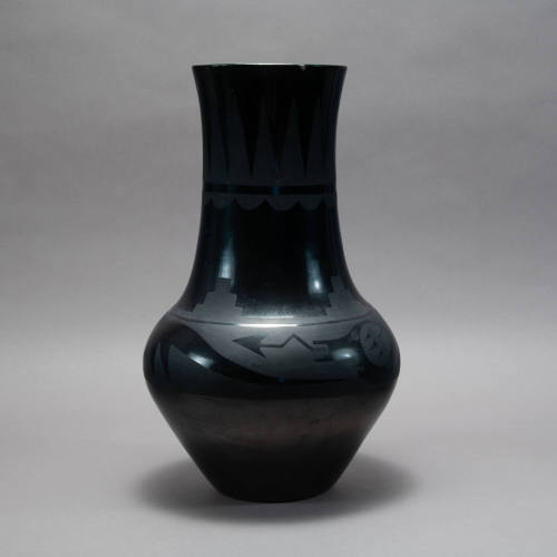 Black-on-black avanyu vase