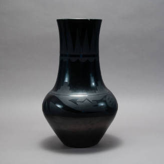 Black-on-black avanyu vase