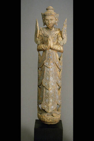 One in Pair of Buddhist Temple Guardians or Deva (angels) in postures of worship

