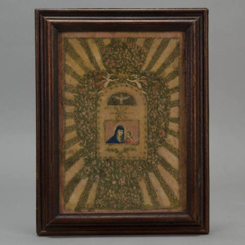 Framed fabric piece, Virgin & Child (actually a sand painting)