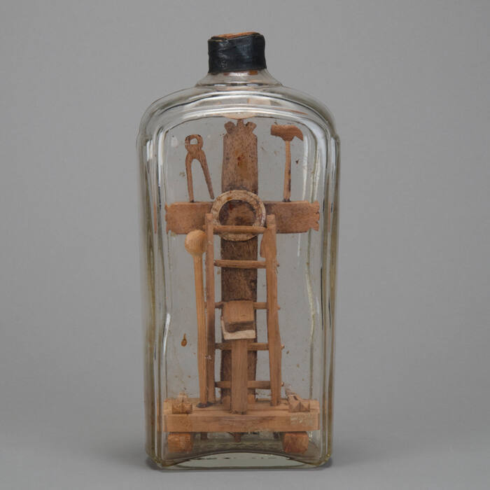 Cross in bottle