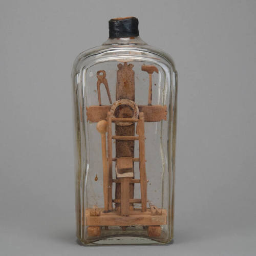 Cross in bottle