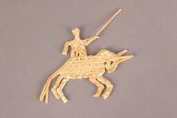 Man on horse with sword in left hand